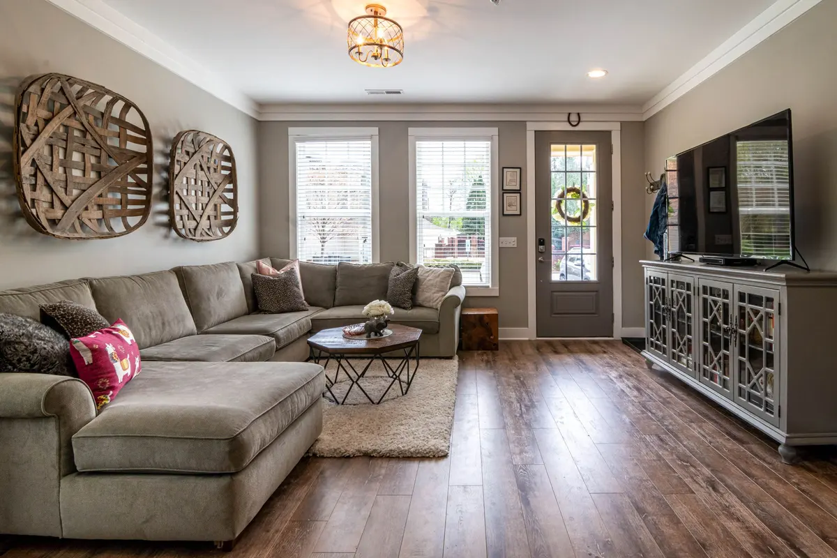Luxury vinyl plank flooring in a bright open living room